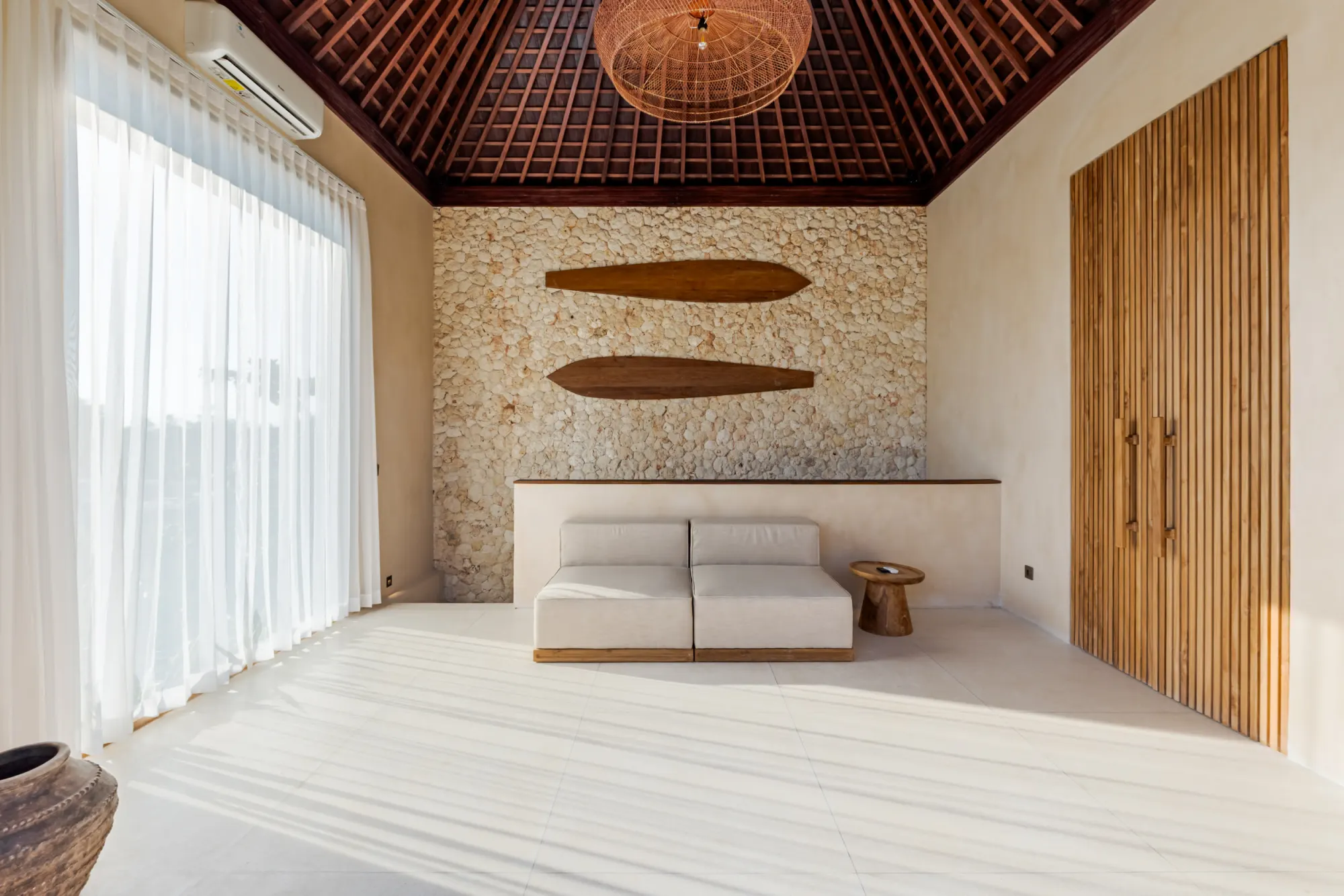 Master bedroom with sliding doors opening to terrace