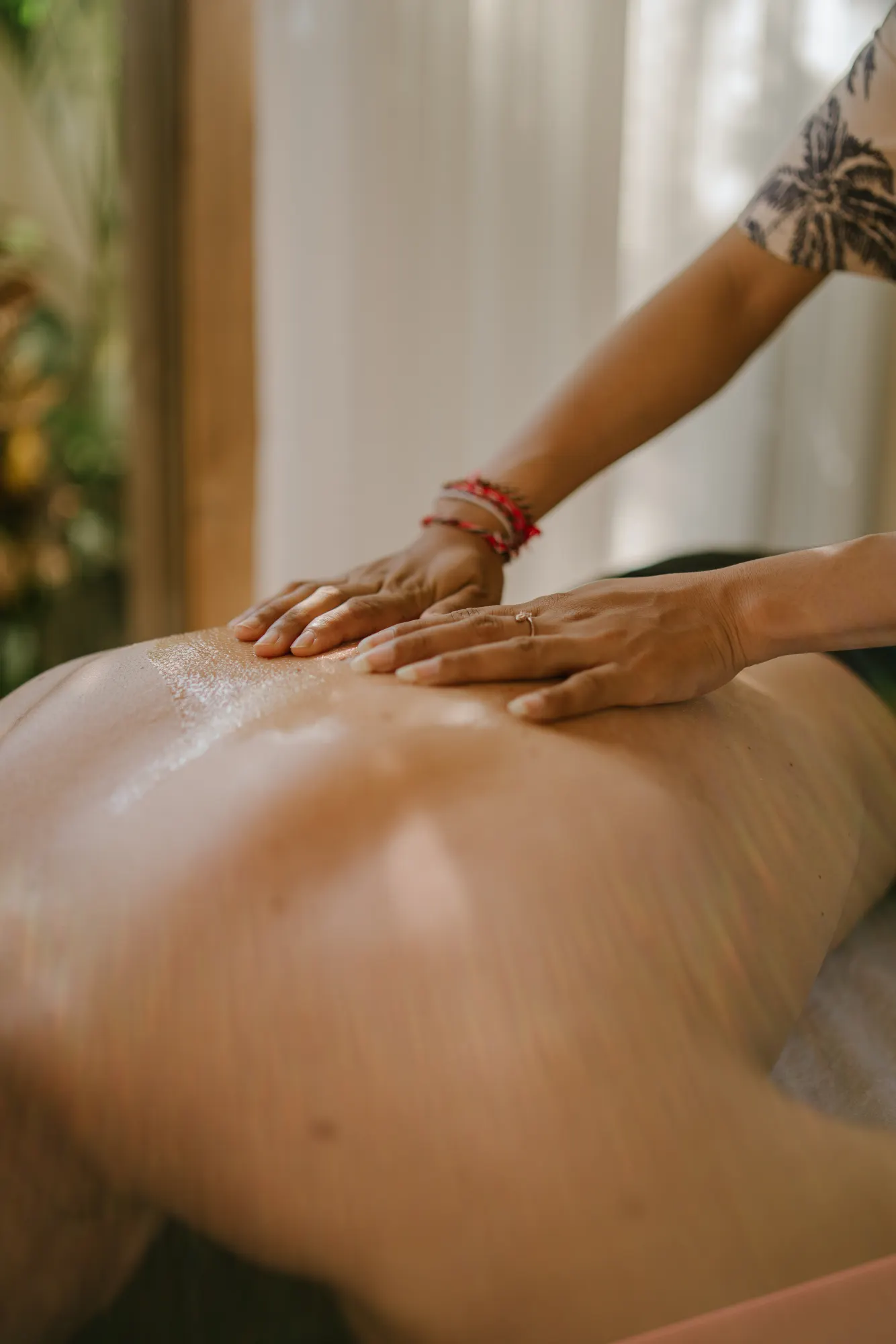 Close-up of massage treatment on client's shoulder