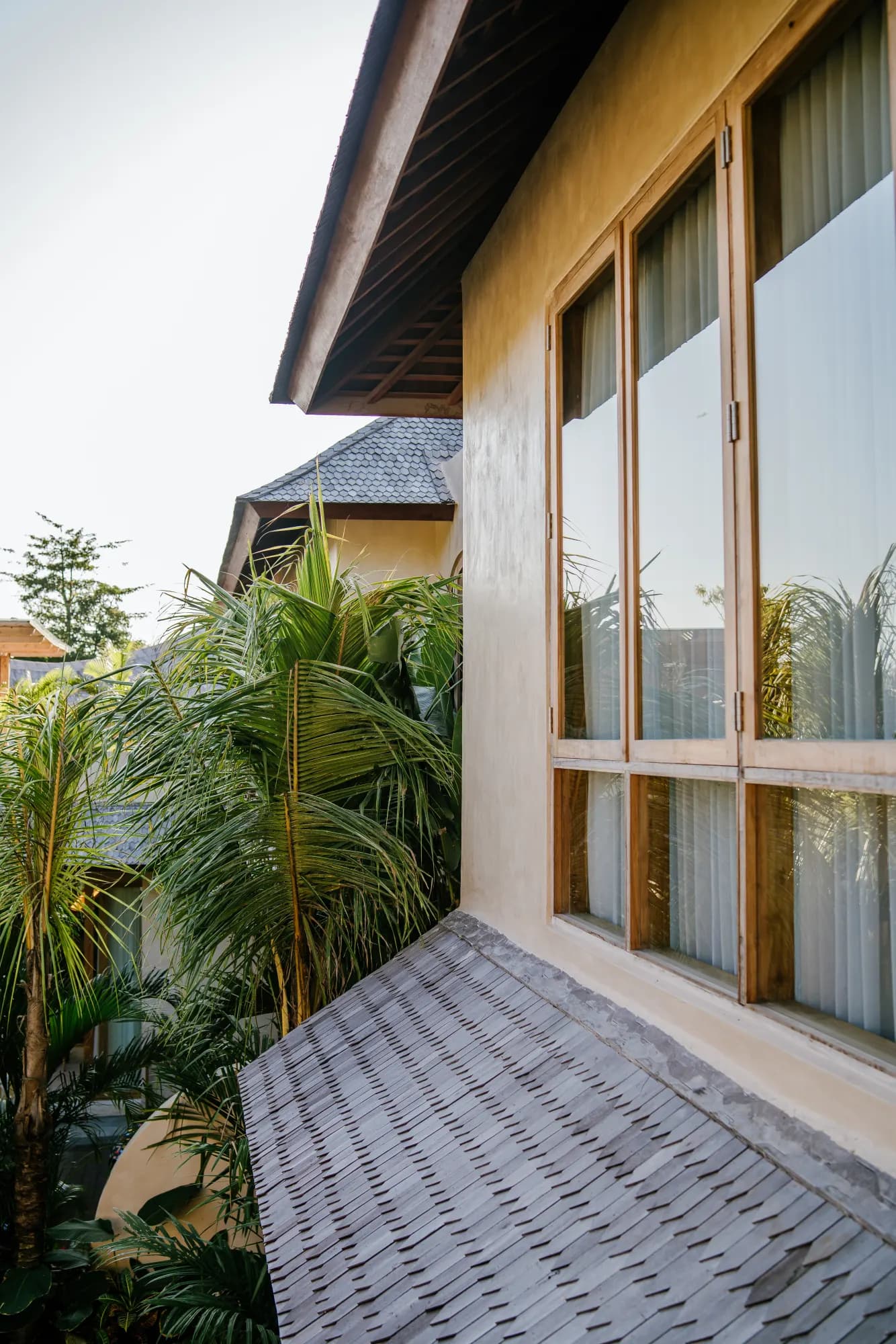Outdoor terrace with contemporary architectural railings and plants