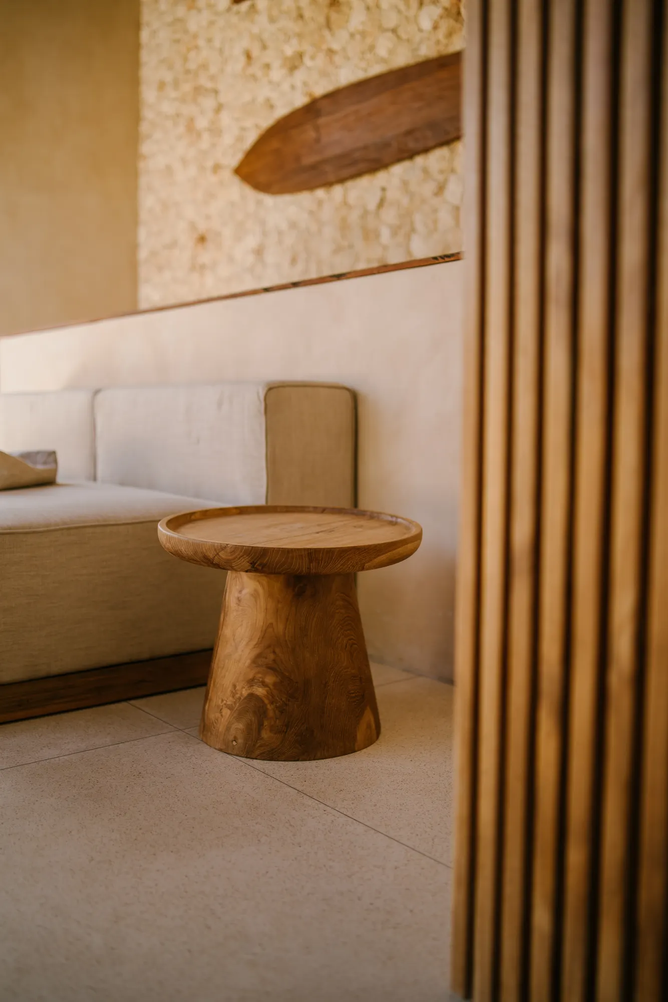 Modern side table and seating in bedroom space